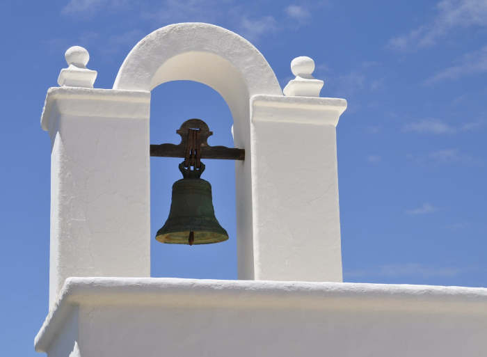 Bell in tower to trigger prayer or church-going