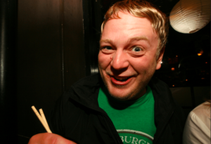 White dude eating sushi