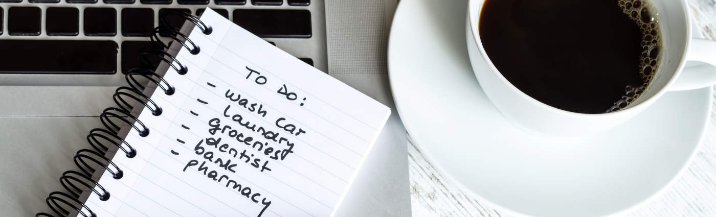 to-do-list-for-prioritization Prioritize tasks writing down to do list on paper with pen